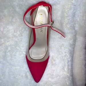 Red pointed PVC heels